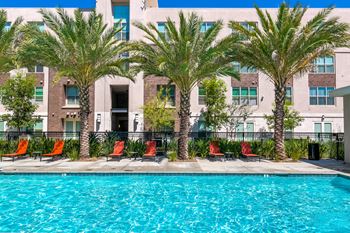Poolside lounge chairs at Aspire Rialto, Rialto